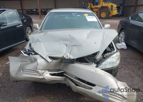 2004 Toyota Camry Le from USA, damaged, VIN 4T1BE32K14U842401